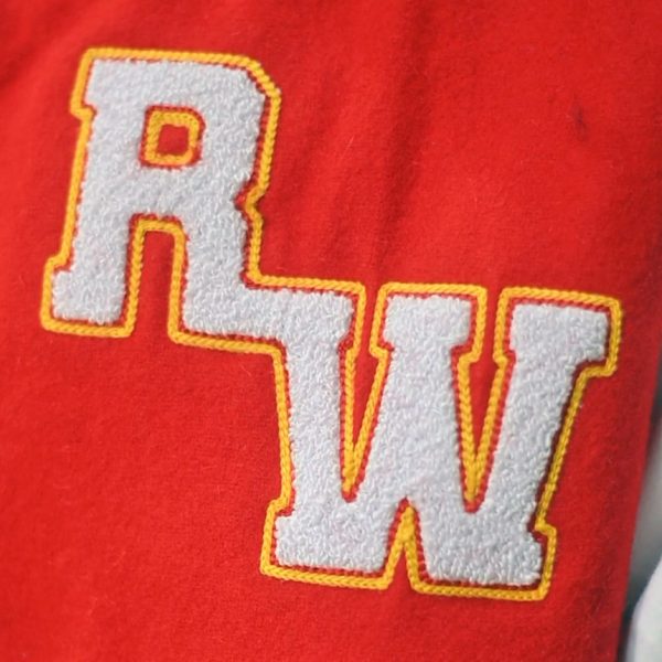 Chenille embroidery on red varsity jacket