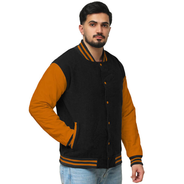Gold and black varsity jacket with wool body and leather sleeves