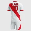 back of white soccer uniform with red asymmetrical stripe and player name and number
