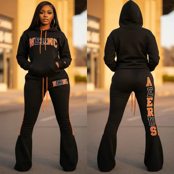 A full black and orange women's sweatsuit with a hoodie and flared bell-bottom pants, featuring an embroidered "NERNC" logo on the top and a "AERUS" logo on the back of the pants.