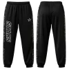 Front and back of black warm-up jogger pants with "STARS" graphics and dark gray geometric side stripes, ideal for team apparel.