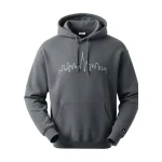 Front view of a charcoal grey pullover hoodie featuring a thin white line art graphic of a city skyline across the chest.
