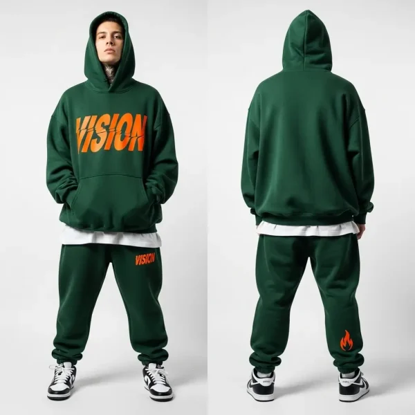 A full dark green fleece sweatsuit, featuring a large orange "VISION" logo on the hoodie and a smaller matching logo on the pants.