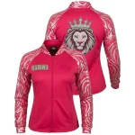 Dual image of a vibrant hot pink cheer jacket with gold scroll print sleeves, featuring the word "QUEENS" on the front and a large, dazzling rhinestone crowned lion on the back.