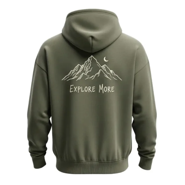 Back of the olive green pullover, featuring a large, central white outline graphic of jagged mountains and the moon above the text 'EXPLORE MORE'.