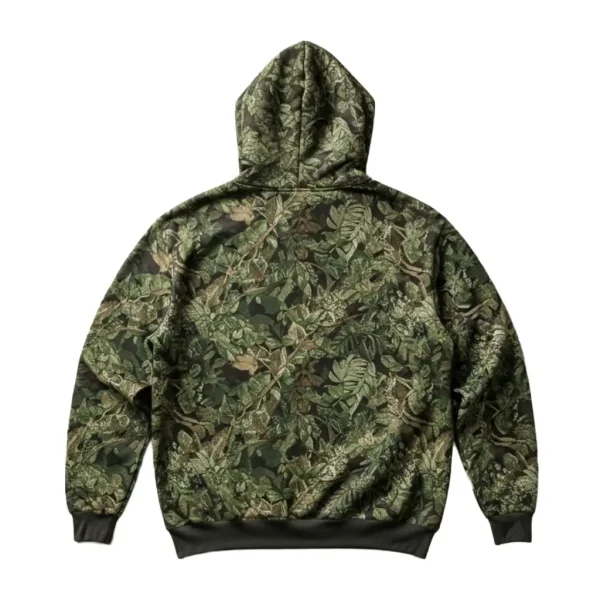 Rear view of the heavyweight hoodie, showcasing the continuous detailed green foliage and leaf camouflage print across the back, with a contrasting solid dark green ribbed hem.