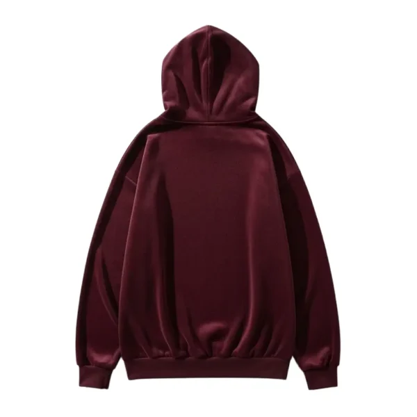 View of the back of the smooth, solid-colored velour sweatshirt, highlighting the rich texture and drape of the fabric and the relaxed fit with a ribbed hem and cuffs.