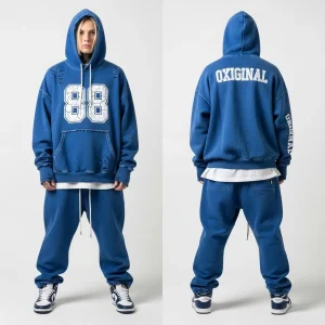 An oversized royal blue fleece tracksuit with a faded wash and distressed tears, featuring a bold "88" number graphic on the front of the top.
