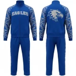 Dual image of a royal blue cheer warm-up tracksuit with a silver geometric print on the sleeves and side pants stripe, featuring a glittering "EAGLES" logo on the front and a matching eagle head design on the back.