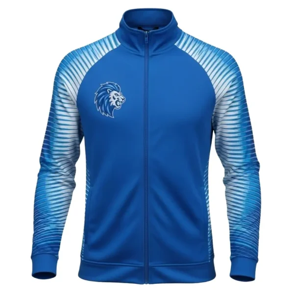 Royal blue full-zip warm-up jacket featuring white and light blue geometric print raglan sleeves and a small, stylized lion head graphic on the chest.