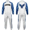 Full white and blue tracksuit, complete with lightning print sleeves, matching pants, and a dazzling blue rhinestone bird logo centered on the back of the jacket.