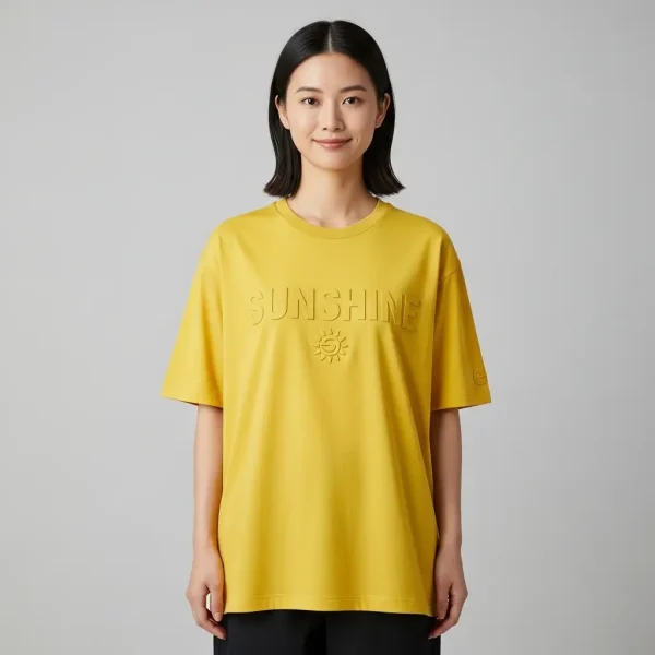 A woman wearing loose fit-yellow embossed shirt.