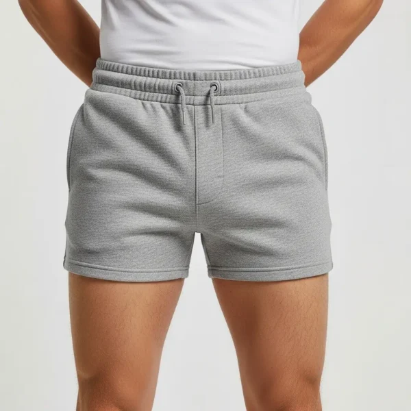 Charcoal gray athletic sweat shorts with a short 5-inch inseam and comfortable elastic waist.