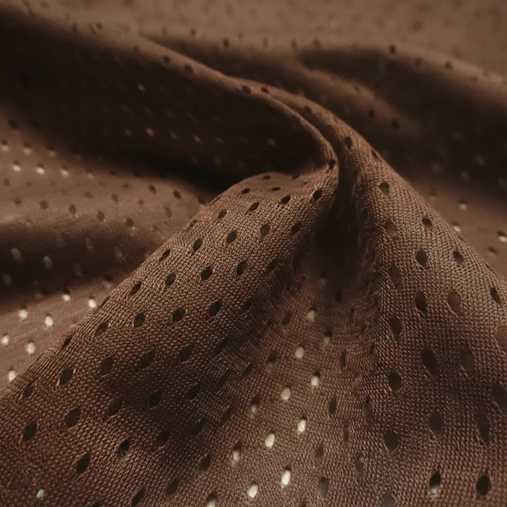 Brown football mesh fabric.