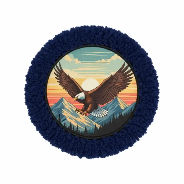 A patch with a printed eagle image inside chenille borders.