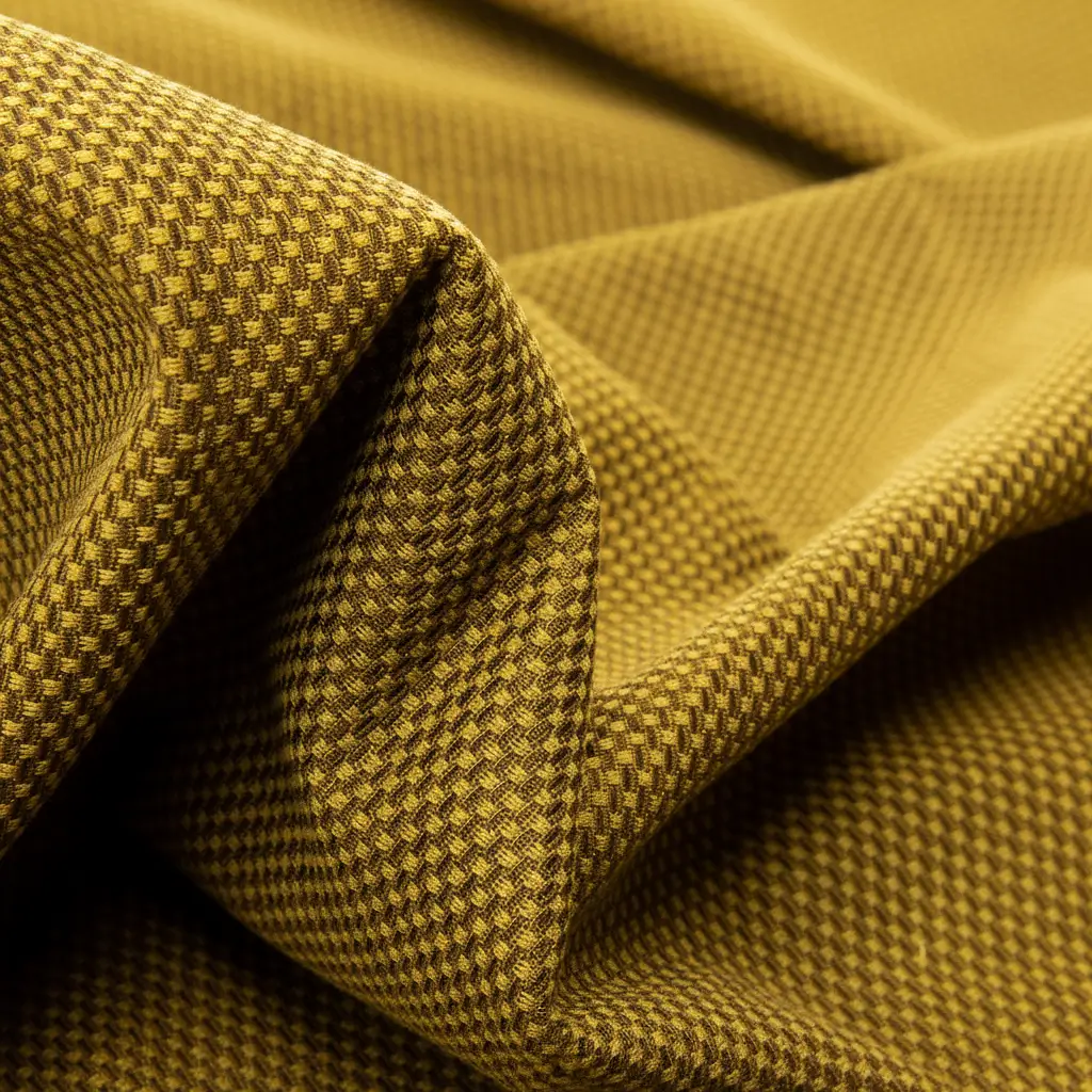 Yellow jacquard mesh fabric.