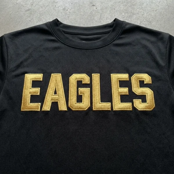 Black embroidered dri fit shirts.