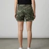 Back view of relaxed fit denim shorts featuring an all-over traditional forest camouflage pattern.