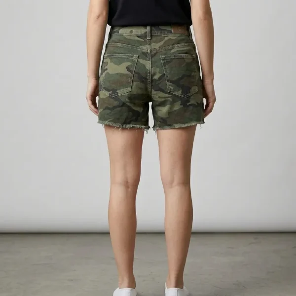 Back view of relaxed fit denim shorts featuring an all-over traditional forest camouflage pattern.
