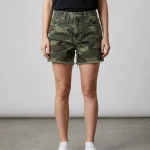 Front view of relaxed fit denim shorts featuring an all-over traditional forest camouflage pattern.