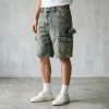 Front view of utility-style carpenter denim shorts showing tool pockets, hammer loops, and reinforced stitching.