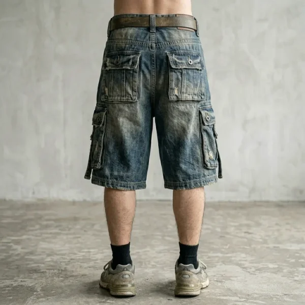 Back view of oversized baggy denim cargo shorts featuring multiple large utility side pockets.