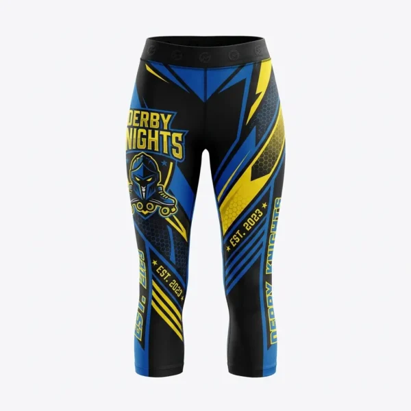 Black, blue, and yellow capri-length roller derby leggings featuring the "Derby Knights" armored mascot and "Est. 2023" branding.