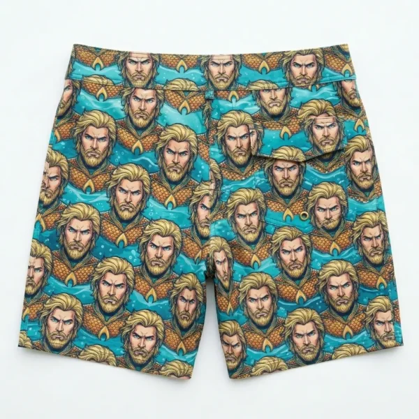 All over aquaman face printed board shorts back.