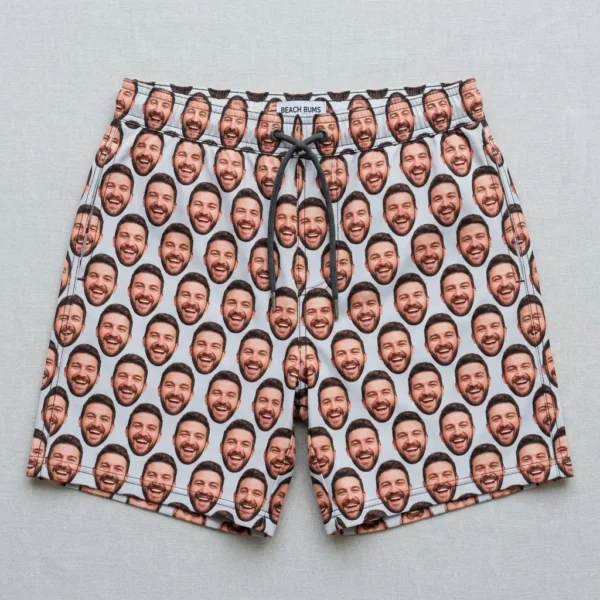 All over face print swim trunks.
