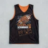 Black and orange reversible basketball pinnie, black front.
