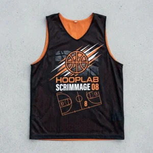 Black and orange reversible basketball pinnie, black front.