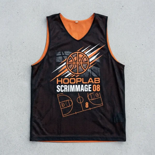 Black and orange reversible basketball pinnie, black front.
