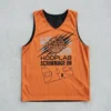 Black and orange reversible basketball pinnie, orange front.