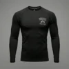 Front view of a heavyweight solid black short sleeve compression rash guard on a ghost mannequin.