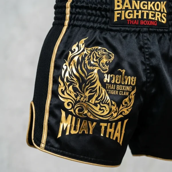 Black metallic foil printed muay thai shorts.