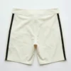 Blank off-white board shorts back.