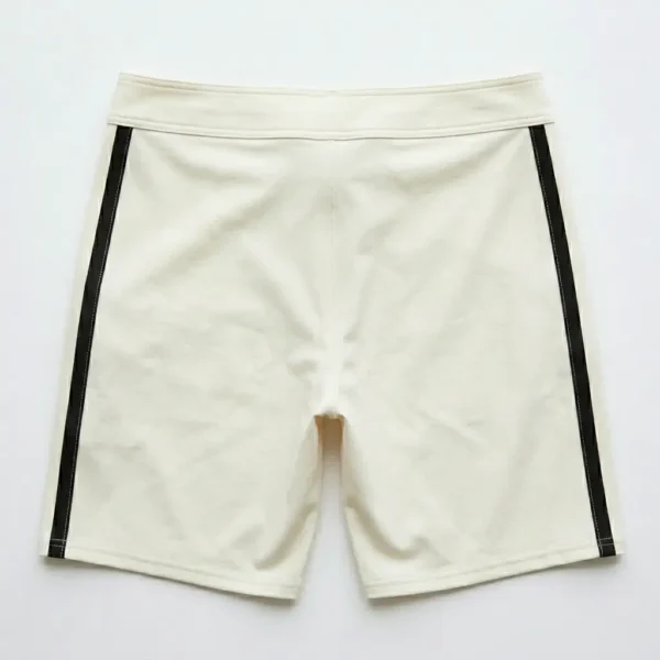 Blank off-white board shorts back.