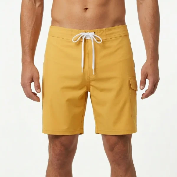 Blank yellow knee length board shorts.
