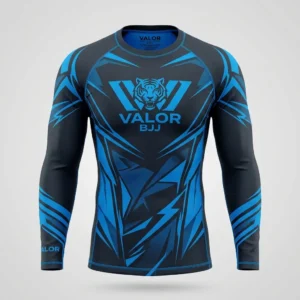 Front view of a charcoal gray compression rash guard featuring vibrant electric blue sublimated side panels and contrast stitching on a ghost mannequin.