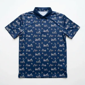 A navy blue short-sleeve polo shirt featuring a repeating pattern of various vintage and modern motorcycles and helmets.