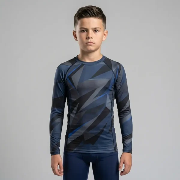 Youth athletic compression rash guard featuring a durable, kid-friendly sublimated pattern that won't crack or peel.