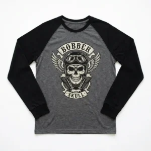 A long-sleeve raglan shirt with contrasting sleeves, printed with a bold skull bobber, highlighting sleeve detail.