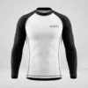 Front view of a white martial arts rash guard featuring contrasting solid black short sleeves and heavy-duty stitching.