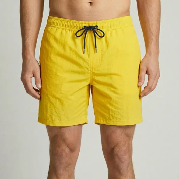 Yellow 7-inch inseam swim trunks.