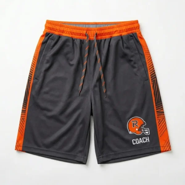 Sublimated charcoal and orange custom coach flag football shorts.