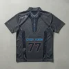 Sublimated dark grey quarter zip eSports jersey back.