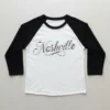 Black and white 3/4 sleeve rhinestone t-shirt front.
