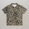 Blank leopard print polo shirt front.