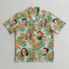 Multi face group print hawaiian shirt front.
