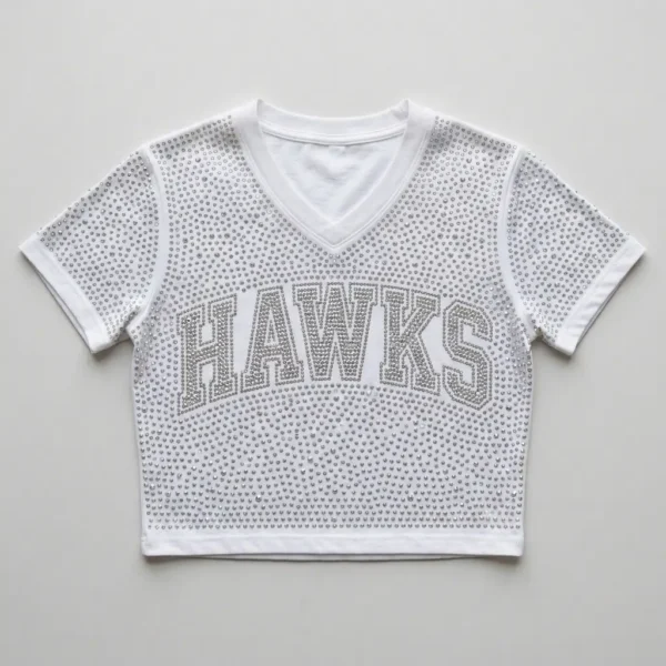 White v-neck cropped fully rhinestone cheer shirt front.